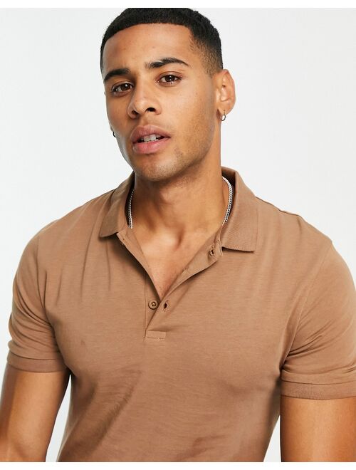 ASOS DESIGN muscle fit jersey polo in brown