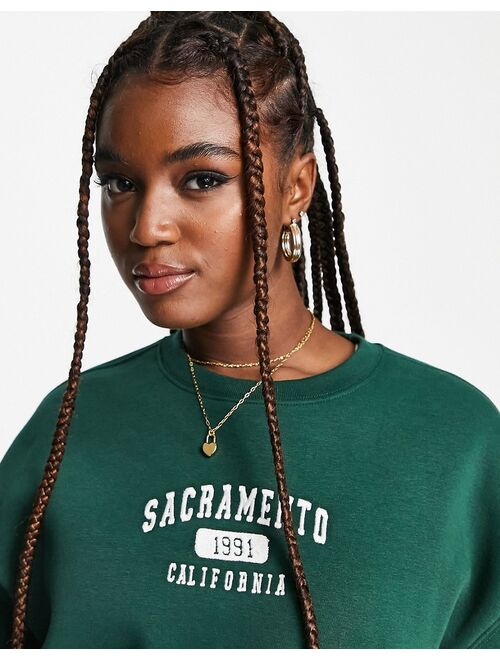Pull&Bear sweatshirt with Sacramento slogan in bottle green