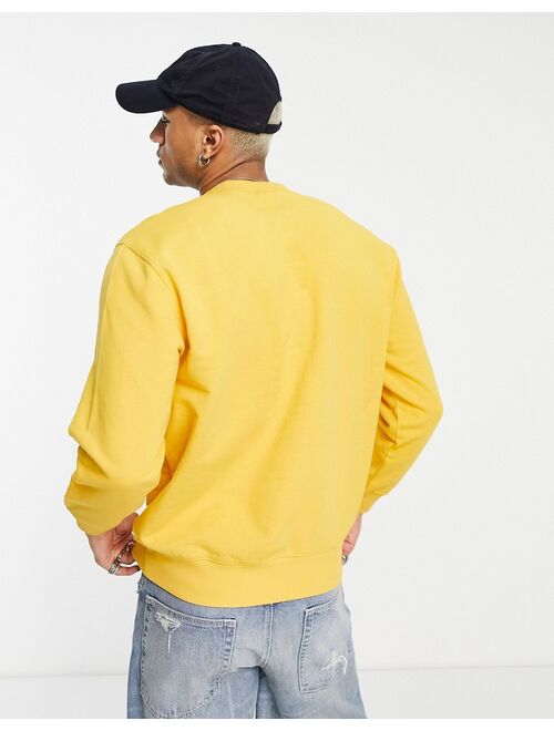 Carhartt WIP Pocket sweatshirt in yellow