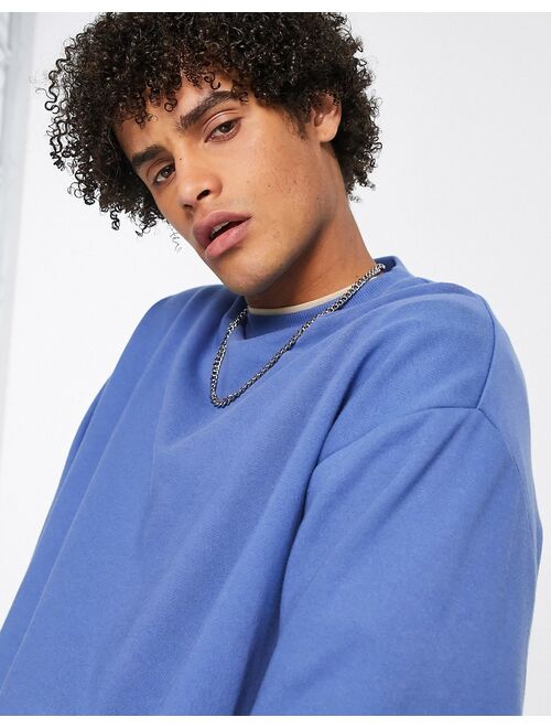 ASOS DESIGN oversized sweatshirt in blue
