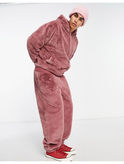 ASOS DESIGN oversized hoodie in pink faux fur