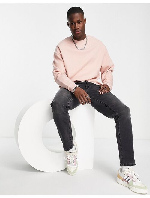 ASOS DESIGN oversized sweatshirt in washed pink