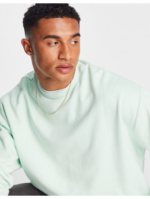 ASOS DESIGN oversized sweatshirt in pastel green