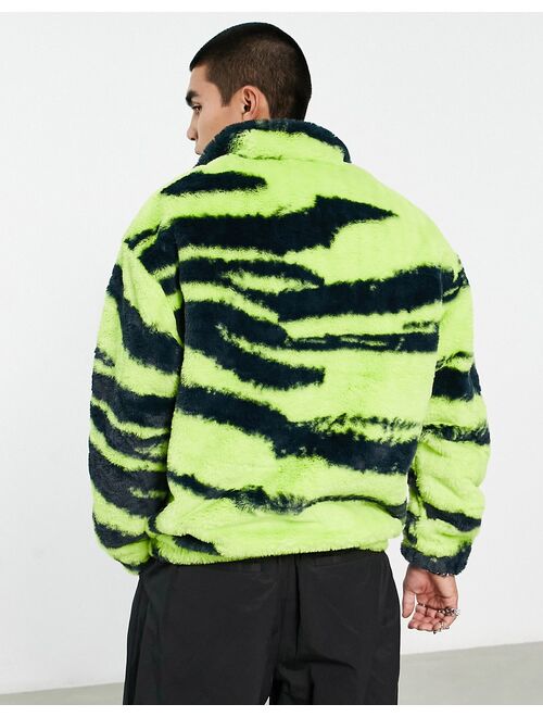 ASOS DESIGN oversized half zip faux fur sweatshirt with green zebra print