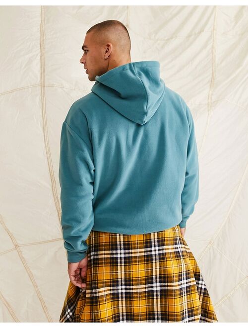 ASOS DESIGN oversized hoodie in blue polar fleece with city embroidery