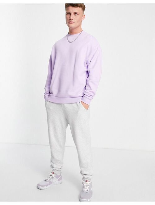 ASOS DESIGN oversized sweatshirt in purple