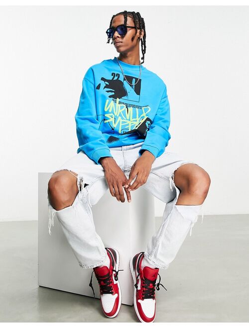 ASOS DESIGN ASOS Unrvlld Spply oversized sweatshirt large graphic front print and logo in blue