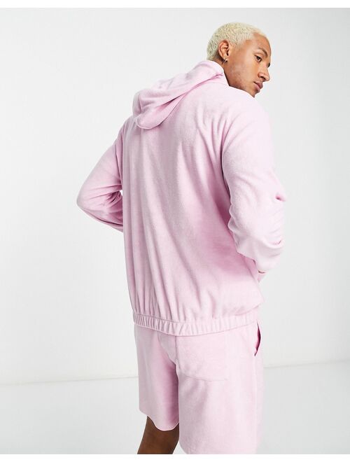 ASOS DESIGN oversized terrycloth hoodie with embroidery detail in pink