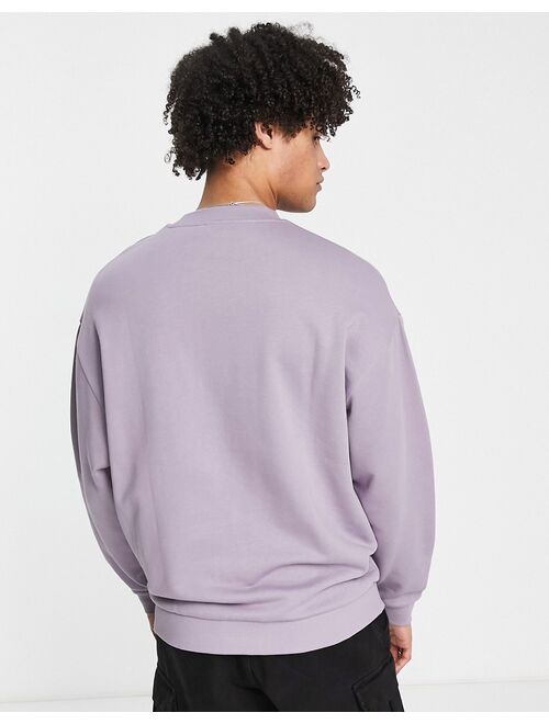 ASOS DESIGN ASOS Dark Future oversized sweatshirt with blurred logo print in purple