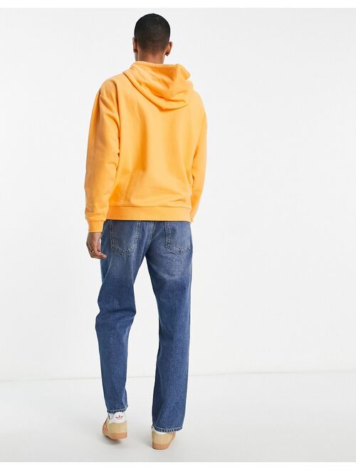 ASOS DESIGN oversized hoodie in pastel orange