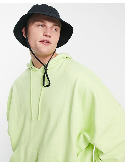ASOS DESIGN super oversized hoodie in washed lime green
