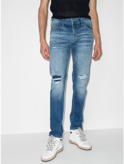 mid-rise distressed skinny jeans