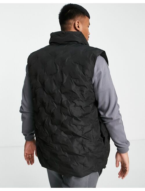 ASOS DESIGN oversized embossed puffer vest in black