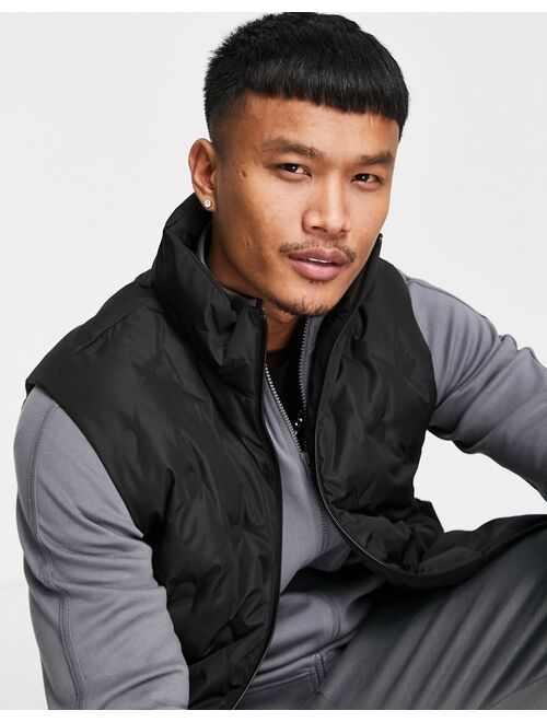 ASOS DESIGN oversized embossed puffer vest in black
