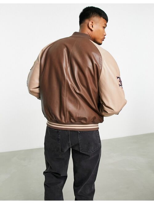 ASOS DESIGN oversized real leather varsity jacket in brown