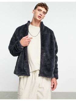 oversized track jacket in washed black faux fur