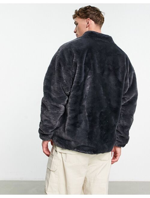 ASOS DESIGN oversized track jacket in washed black faux fur