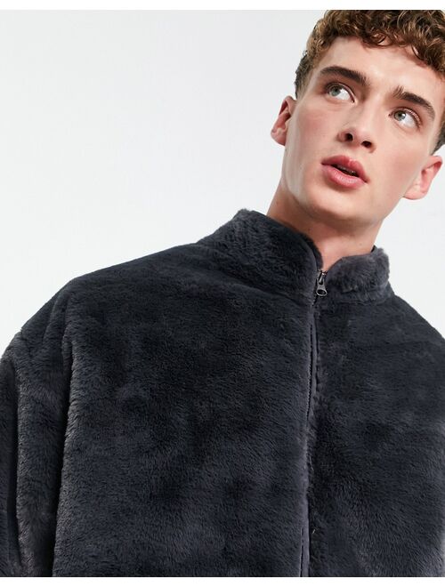ASOS DESIGN oversized track jacket in washed black faux fur