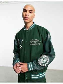 oversized varsity jacket with real leather sleeves in green