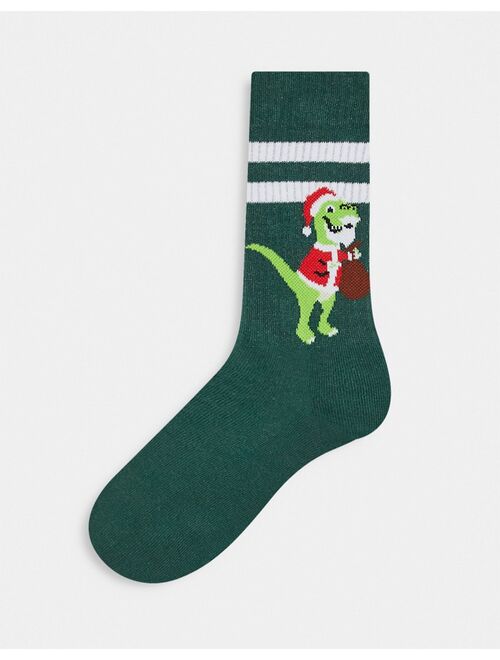 ASOS DESIGN sports socks in green with Christmas dinosaur and stripe