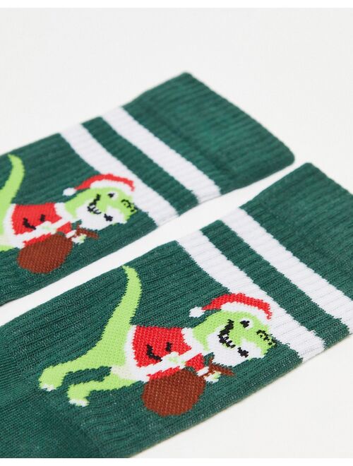 ASOS DESIGN sports socks in green with Christmas dinosaur and stripe