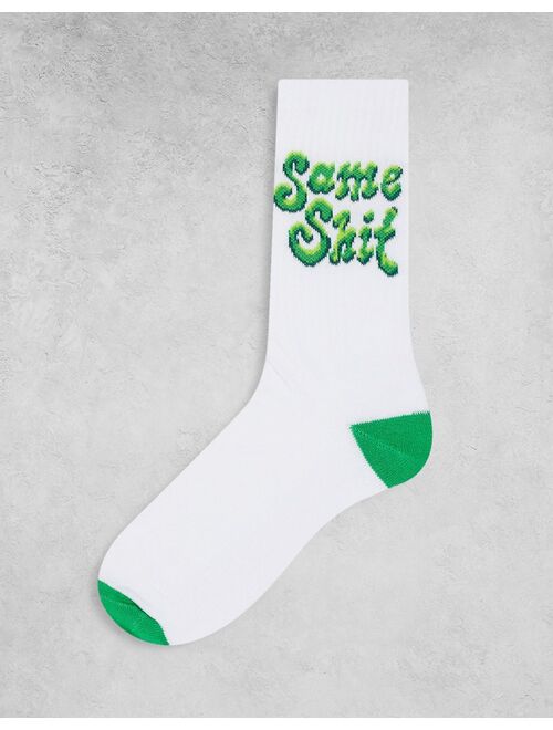 ASOS DESIGN sports socks with green same shit print