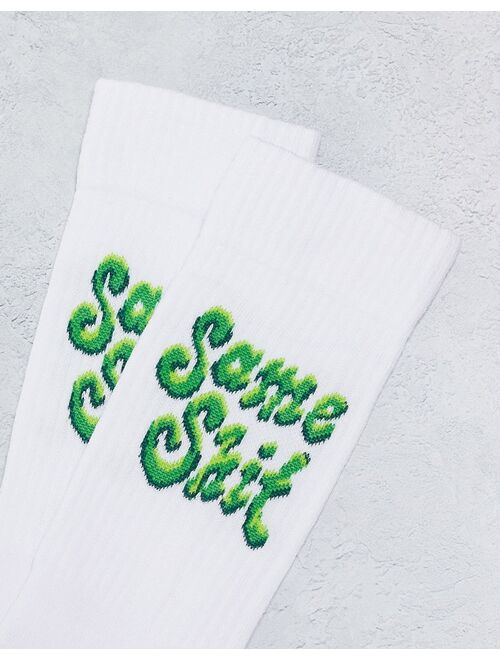 ASOS DESIGN sports socks with green same shit print