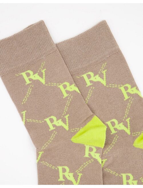 Reclaimed Vintage Inspired unisex logo socks in yellow all-over print