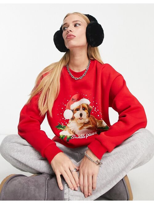 ASOS DESIGN Christmas oversized sweatshirt with santa paws print in bright red