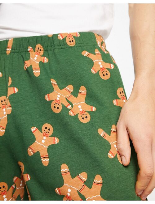 ASOS DESIGN lounge short in green with Christmas gingerbread man print