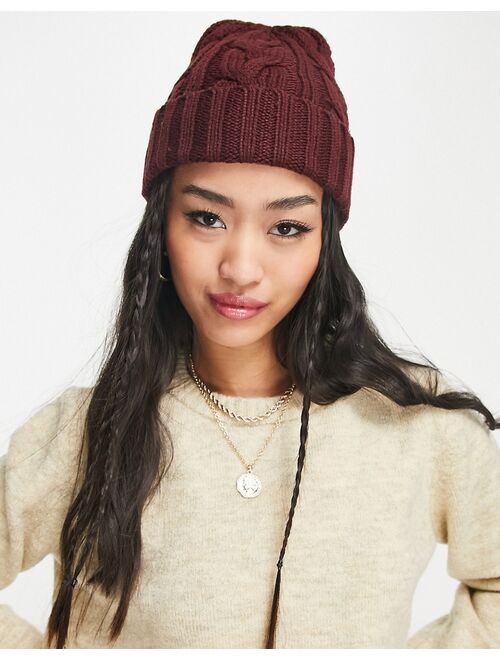 ASOS DESIGN polyester cable knit beanie in burgundy