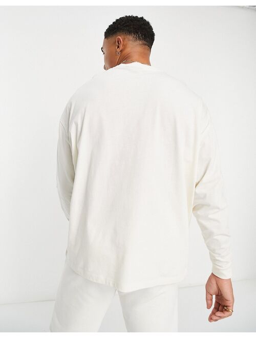 ASOS DESIGN long sleeve oversized t-shirt in cream