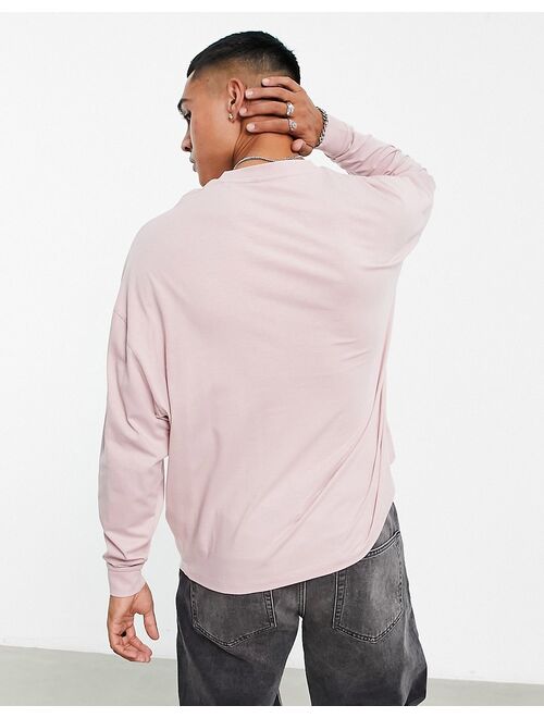 ASOS DESIGN long sleeve oversized t-shirt in washed pink