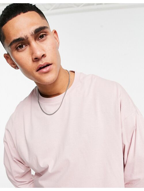 ASOS DESIGN long sleeve oversized t-shirt in washed pink