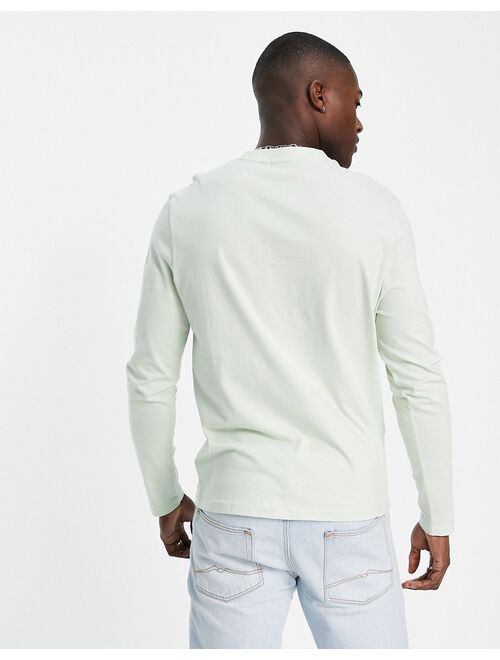 ASOS DESIGN long sleeve T-shirt with crew neck in washed green