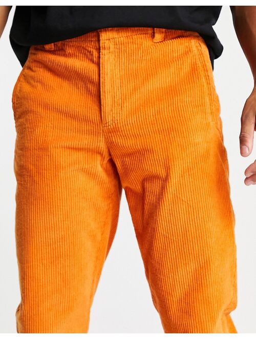 Topman relaxed cord pants in orange