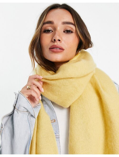 ASOS DESIGN supersoft scarf with tassels in yellow