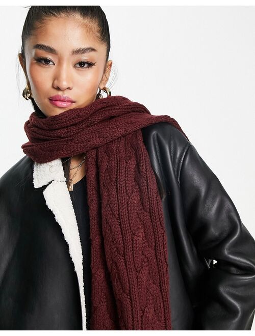 ASOS DESIGN polyester cable knit tassel scarf in burgundy