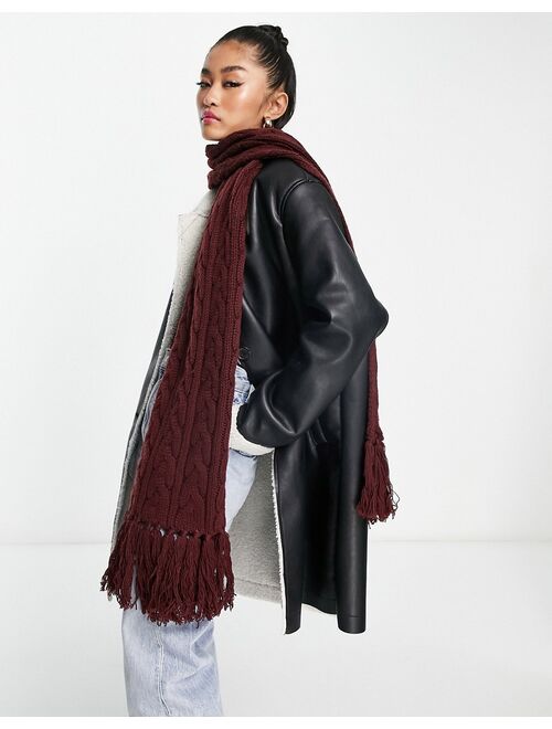 ASOS DESIGN polyester cable knit tassel scarf in burgundy