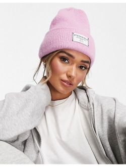 label beanie in pink