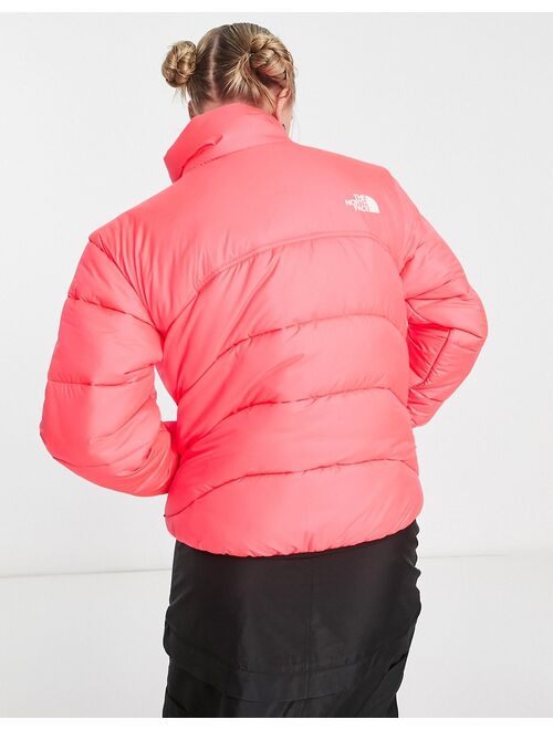 The North Face NSE 2000 puffer jacket in bright coral