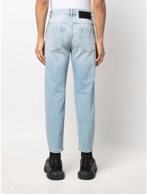 Balmain embossed-logo slim-cut jeans