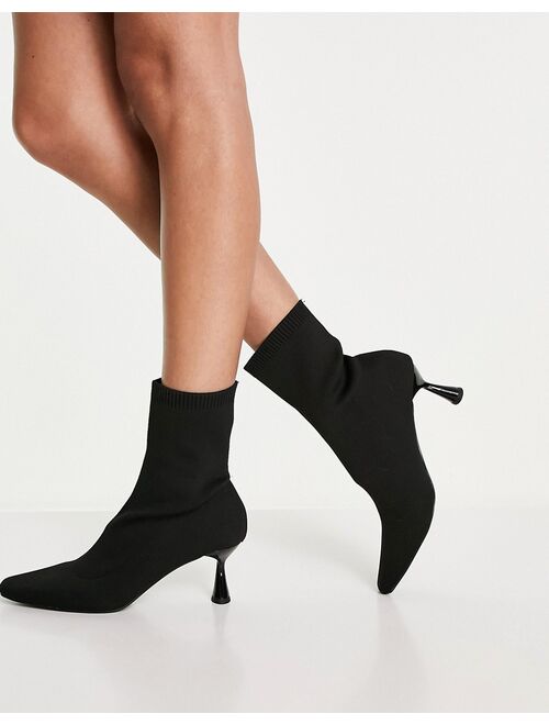 ASOS DESIGN Wide Fit Rightly knitted heeled sock boots in black