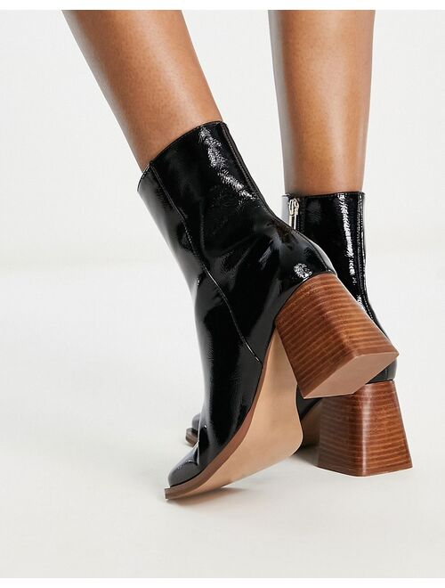 ASOS DESIGN Reform mid-heel boots in black patent