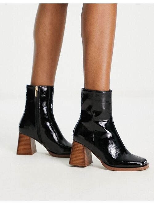 ASOS DESIGN Reform mid-heel boots in black patent