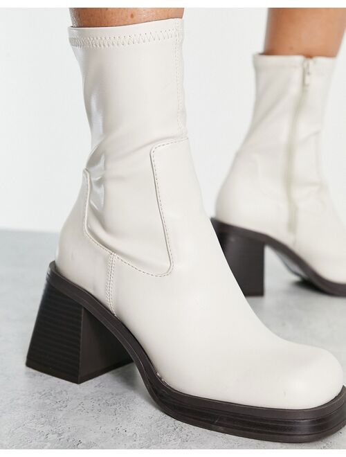 ASOS DESIGN Reversed mid-heel sock boots in off white