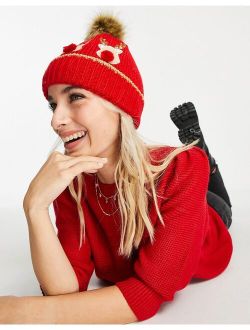 Boardmans christmas faux fur pom with reindeers beanie in red