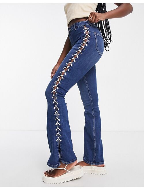 Topshop Y2K lace up Jamie Flare jeans in indigo