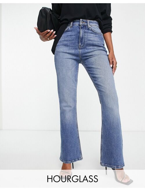 ASOS DESIGN Hourglass flared jeans in mid blue