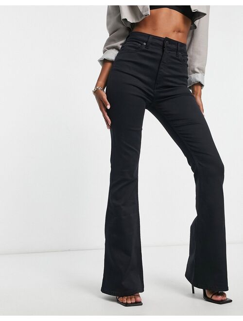 ASOS DESIGN Hourglass power stretch flared jeans in black